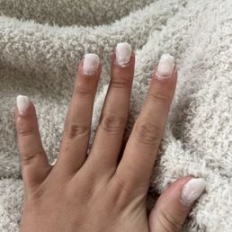 Lina's white acrylic that won't come off. Lina's white acrylic that won't come off.