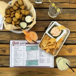 Fried pickles, salmon dip, classic marg, frozen Paloma, pickle tini