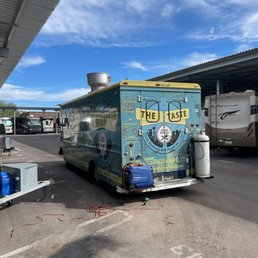 a food truck parked in a parking lot