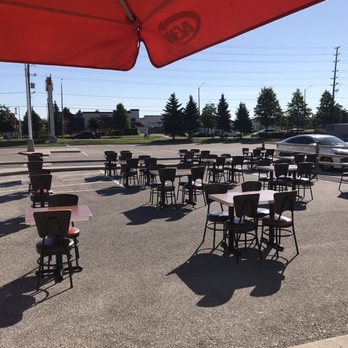A&W - tables and chairs in a parking lot - Burgers Near Me - Mississauga, Ontario A&W - tables and chairs in a parking lot - Burgers Near Me - Mississauga, Ontario