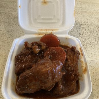 Negril - The curry shrimp was too spicy son they gave me this...brown gravy chicken a lot less spicy but less flavor - Caribbean Near Me - Orlando, Florida
