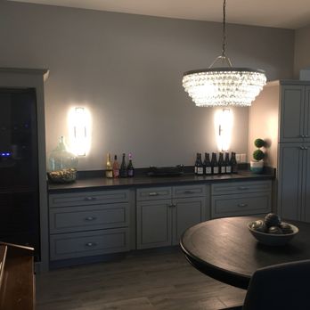 AZ Stone & Tile Concepts - a dining room with a chandelier - General Contractors Near Me - Phoenix, Arizona AZ Stone & Tile Concepts - a dining room with a chandelier - General Contractors Near Me - Phoenix, Arizona