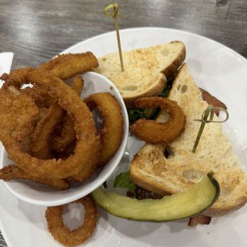 Broken Yolk Cafe - The onion rings are the best.  This sandwich was wonderful so easy to eat. - Breakfast & Brunch Near Me - La Verne, California