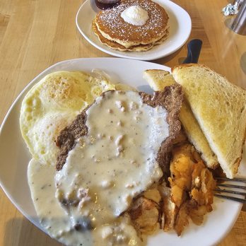 Sunshine Breakfast Bar - Chicken fried steak. Eggs over medium. Country potatoes. Sourdough toast and a side of pancakes. - Breakfast & Brunch Near Me - Phoenix, Arizona Sunshine Breakfast Bar - Chicken fried steak. Eggs over medium. Country potatoes. Sourdough toast and a side of pancakes. - Breakfast & Brunch Near Me - Phoenix, Arizona
