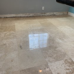 Polished travertine floor restoration and sealed by Roth Stone Restoration