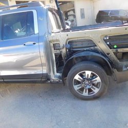 Photo of Gene's Import Auto Body - Sand City, CA, US. Replacing the LT Bedside on this 2017 Honda Ridgeline