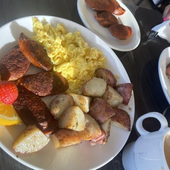 Sweet E's Cafe - Two eggs with potatoes and Portuguese sausage. - Cafes Near Me - Honolulu, Hawaii Sweet E's Cafe - Two eggs with potatoes and Portuguese sausage. - Cafes Near Me - Honolulu, Hawaii