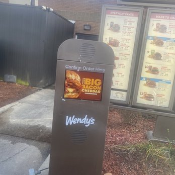 Wendy's - a sign for a fast food restaurant - Burgers Near Me - Douglasville, Georgia Wendy's - a sign for a fast food restaurant - Burgers Near Me - Douglasville, Georgia
