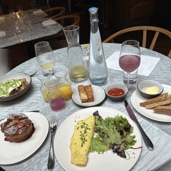 Lyle's - Short rib hash, monkey bread, omelette with whipped goat cheese, crispy hash browns, & bottomless offering with fresh juices - Breakfast & Brunch Near Me - Washington, DC, District of Columbia