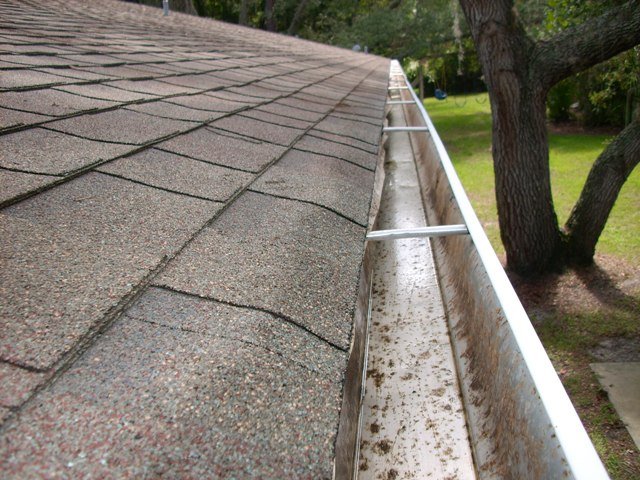 Slide of Tropical Roof & Exterior Cleaning Systems