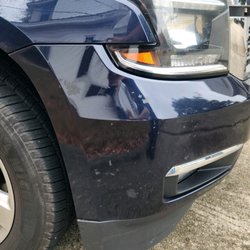 Flagstop Car Wash - whole front corner paint damage.