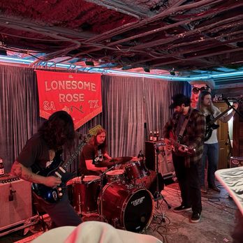 The Lonesome Rose - Stage area (rattlesnake milk) - Bars Near Me - San Antonio, Texas