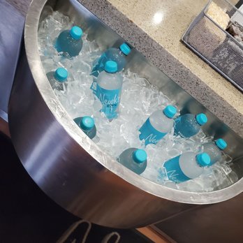 Newk's Eatery - a stainless steel ice bucket filled with bottled water - Pizza Near Me - Hattiesburg, Mississippi Newk's Eatery - a stainless steel ice bucket filled with bottled water - Pizza Near Me - Hattiesburg, Mississippi