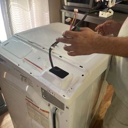 Jay’s Appliance Repair - Replacing new rollers, new belt and new tensioner