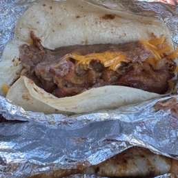 Bean and cheese taco with bacon