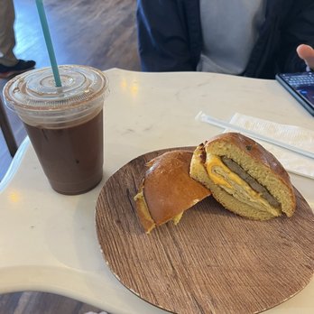 NBHD - chicken sausage egg sandwich on brioche and Mocha latte - Coffee & Tea Near Me - New York, New York NBHD - chicken sausage egg sandwich on brioche and Mocha latte - Coffee & Tea Near Me - New York, New York