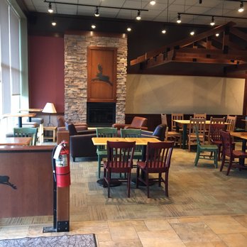 Caribou Coffee - Warm and inviting dining room with a living room feel. - Coffee & Tea Near Me - Osseo, Minnesota
