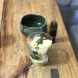 Spruce Cafe - Our popular matchaffogato with premium Uji matcha shot whisked to order over 2 scoops of vanilla ice cream.
