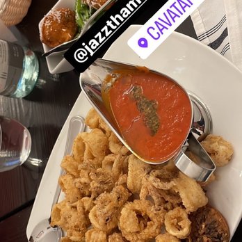 Cavatappi NYC - a plate of fried squids and a bowl of tomato sauce - Italian Near Me - Brooklyn, New York