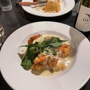 Capers - Shrimp and Grits front and stuffed chicken back - American Near Me - Little Rock, Arkansas