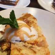Photo of Plum Bistro - Seattle, WA, United States. My favorite dish of the night, the Bread Pudding. Blackberry cheesecake and Carrot cake (with sprinkles) in the background.