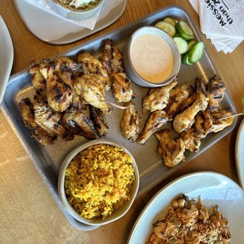 Nando's Peri-Peri - Mango Lime and Lemon Herb Wings, cauliflower. Rice and coleslaw - South African Near Me - Houston, Texas Nando's Peri-Peri - Mango Lime and Lemon Herb Wings, cauliflower. Rice and coleslaw - South African Near Me - Houston, Texas