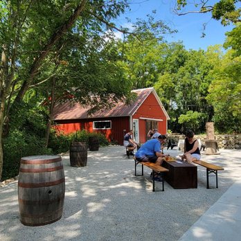 Farmhaus Cider Co. - a group of people sitting at a table - Cideries Near Me - Hudsonville, Michigan Farmhaus Cider Co. - a group of people sitting at a table - Cideries Near Me - Hudsonville, Michigan
