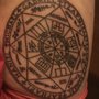 Photo of Color Bomb Tattoo and Body Piercing