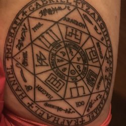 Color Bomb Tattoo and Body Piercing