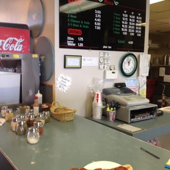 Abo's Pizza - a slice of pizza on a plate - Pizza Near Me - Boulder, Colorado