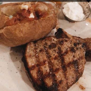 Tom Brown's Restaurant - Pork-chop with loaded baked potato. - Cocktail Bars Near Me - Madison, Alabama Tom Brown's Restaurant - Pork-chop with loaded baked potato. - Cocktail Bars Near Me - Madison, Alabama