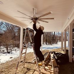 A&A Brothers Contractors - Installing a fan under a deck