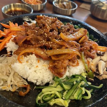 Hansik - Spicy pork with crispy rice on the stone griddle - Salad Near Me - Portland, Oregon Hansik - Spicy pork with crispy rice on the stone griddle - Salad Near Me - Portland, Oregon