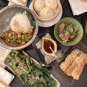 Jade Rabbit - Char Siu Bao, Chili Oil Wontons, Beancurd Skin Dumplings, Lo Mai Gai, Gailan, Mapo Tofu (from top, clockwise) - Asian Fusion Near Me - Portland, Oregon Jade Rabbit - Char Siu Bao, Chili Oil Wontons, Beancurd Skin Dumplings, Lo Mai Gai, Gailan, Mapo Tofu (from top, clockwise) - Asian Fusion Near Me - Portland, Oregon