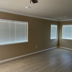 Budget Blinds of Lafayette - Norman Faux wood Blinds. Great Product for Rental Properties ,Garages.  Clean Looking Product at very Price Friendly cost.