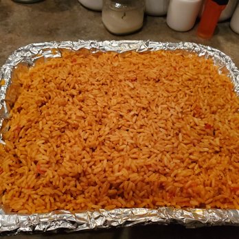 Mosun's Kitchen - a pan of cooked rice - African Near Me - Gaithersburg, Maryland