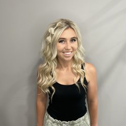 Photo shoot ready: curled blonde hair with a topsy turvy bubble braid