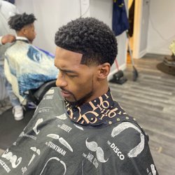 The Gentlemens Barber Shop - Curly Fro with a Mid-Taper and Facial Grooming. Done by @Intrinsicbarber   (810)814-9689 Book.thecut.co/Clutchbarber