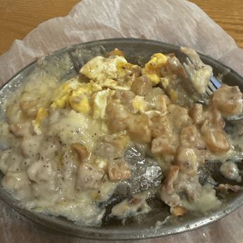 Tequila Grill & Cantina - Fried potatoes, egg over medium covered in sausage gravy!!! - Mexican Near Me - Charlotte Hall, Maryland Tequila Grill & Cantina - Fried potatoes, egg over medium covered in sausage gravy!!! - Mexican Near Me - Charlotte Hall, Maryland