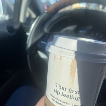 Starbucks - a hand holding a cup of coffee - Coffee & Tea Near Me - San Antonio, Texas Starbucks - a hand holding a cup of coffee - Coffee & Tea Near Me - San Antonio, Texas