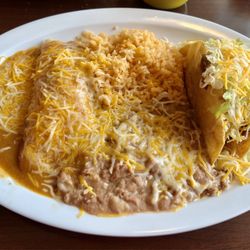 Los Amigos Mexican Food - Combo #4. Beef taco and cheese enchilada. Really good. Beef was shredded and appeared to had been deep fried.