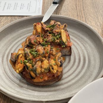 Apolonia - Mussel Toast - Modern European Near Me - Chicago, Illinois Apolonia - Mussel Toast - Modern European Near Me - Chicago, Illinois