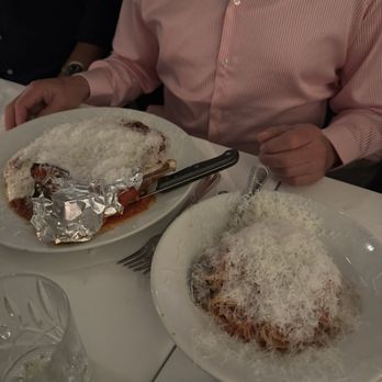 Modo Mio Rustic Italian Kitchen - Mountain of Parmesan cheese on parmigiana - Italian Near Me - Newport Beach, California Modo Mio Rustic Italian Kitchen - Mountain of Parmesan cheese on parmigiana - Italian Near Me - Newport Beach, California