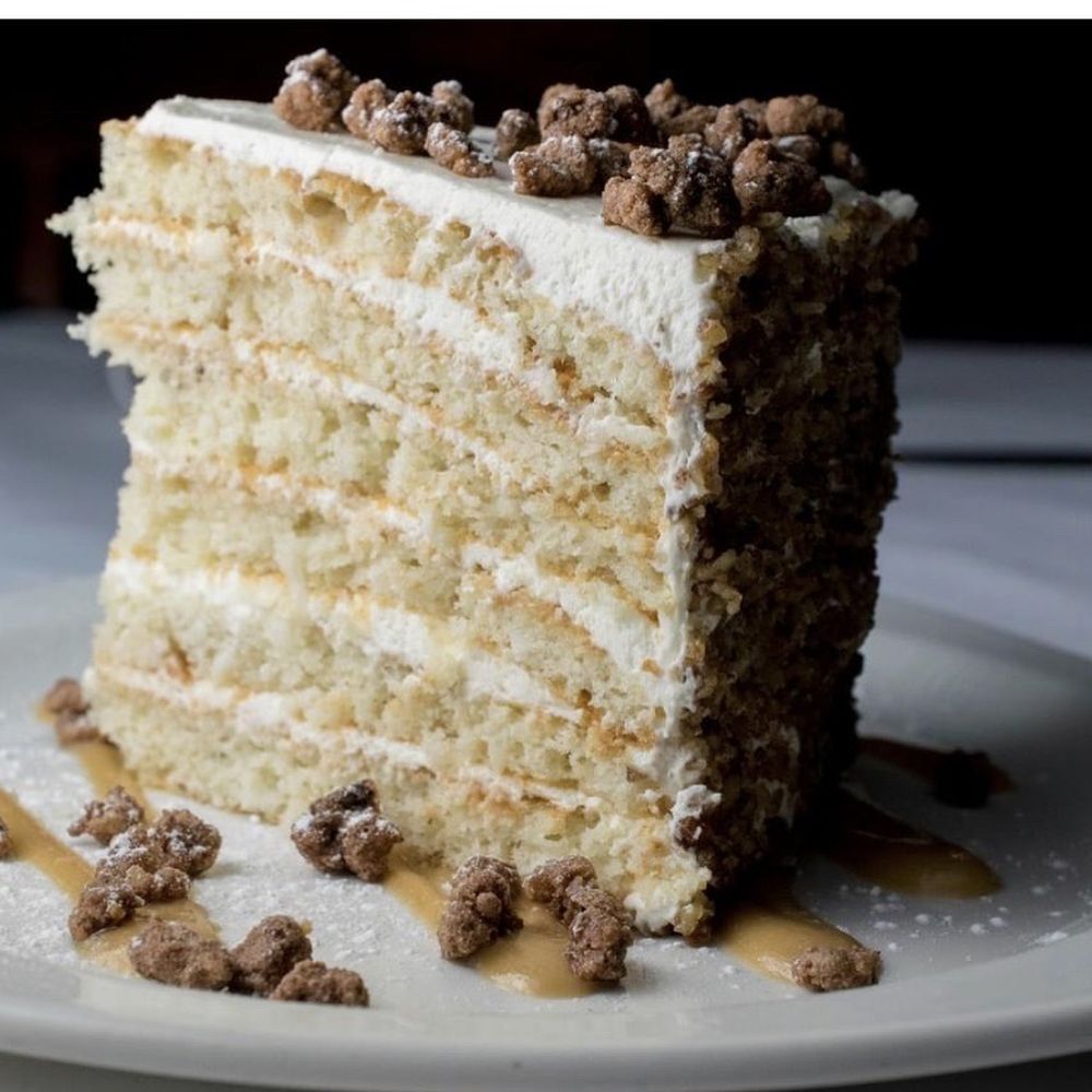 Silver Fox Steakhouse - Pecan Cake with whipped cream frosting - Steakhouses Near Me - Fort Worth, Texas Silver Fox Steakhouse - Pecan Cake with whipped cream frosting - Steakhouses Near Me - Fort Worth, Texas