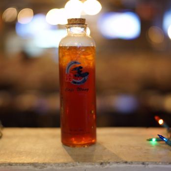 Cafe Wang - Peach black tea in Cafe Wang's nice glass to-go bottles - Dim Sum Near Me - La Verne, California