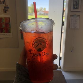 Java Doc - a hand holding a cup of iced tea - Coffee & Tea Near Me - Alturas, California