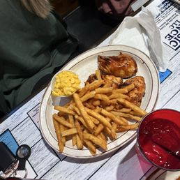 Bbq grilled Chicken Breast with French Fries and Mac and Cheese Bbq grilled Chicken Breast with French Fries and Mac and Cheese
