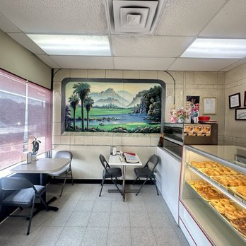 Donut King - Eating area and a beautiful mural. - Donuts Near Me - Dallas, Texas Donut King - Eating area and a beautiful mural. - Donuts Near Me - Dallas, Texas
