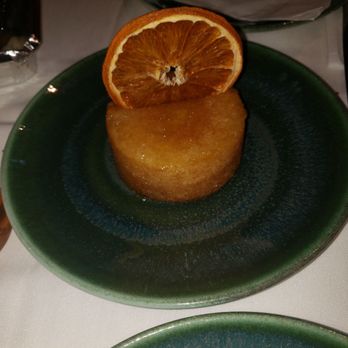 The Guest House - Olive Oil Cake. I saw how shiny it was and I thought, It's gonna taste like olive oil. When I put my spoon into it I was like "OMG" - Mediterranean Near Me - Levittown, New York The Guest House - Olive Oil Cake. I saw how shiny it was and I thought, It's gonna taste like olive oil. When I put my spoon into it I was like "OMG" - Mediterranean Near Me - Levittown, New York