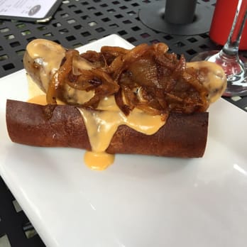 Schatzis Pub - Cheddar bratwurst with cheddar bier cheese and caramelized onions - German Near Me - Poughkeepsie, New York Schatzis Pub - Cheddar bratwurst with cheddar bier cheese and caramelized onions - German Near Me - Poughkeepsie, New York